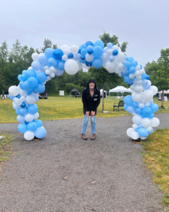 Kate under the balloon arch