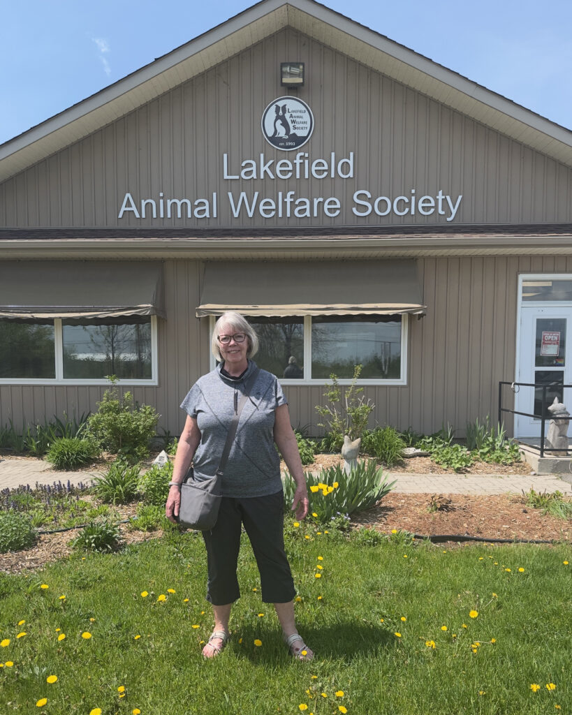 Raffle winner Dorothy outside of LAWS