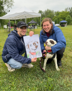 Barney with his caricature, along with Matthew and Rachel