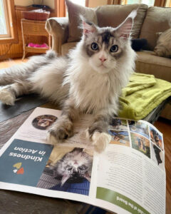 Charlie with his photo in the Annual Report